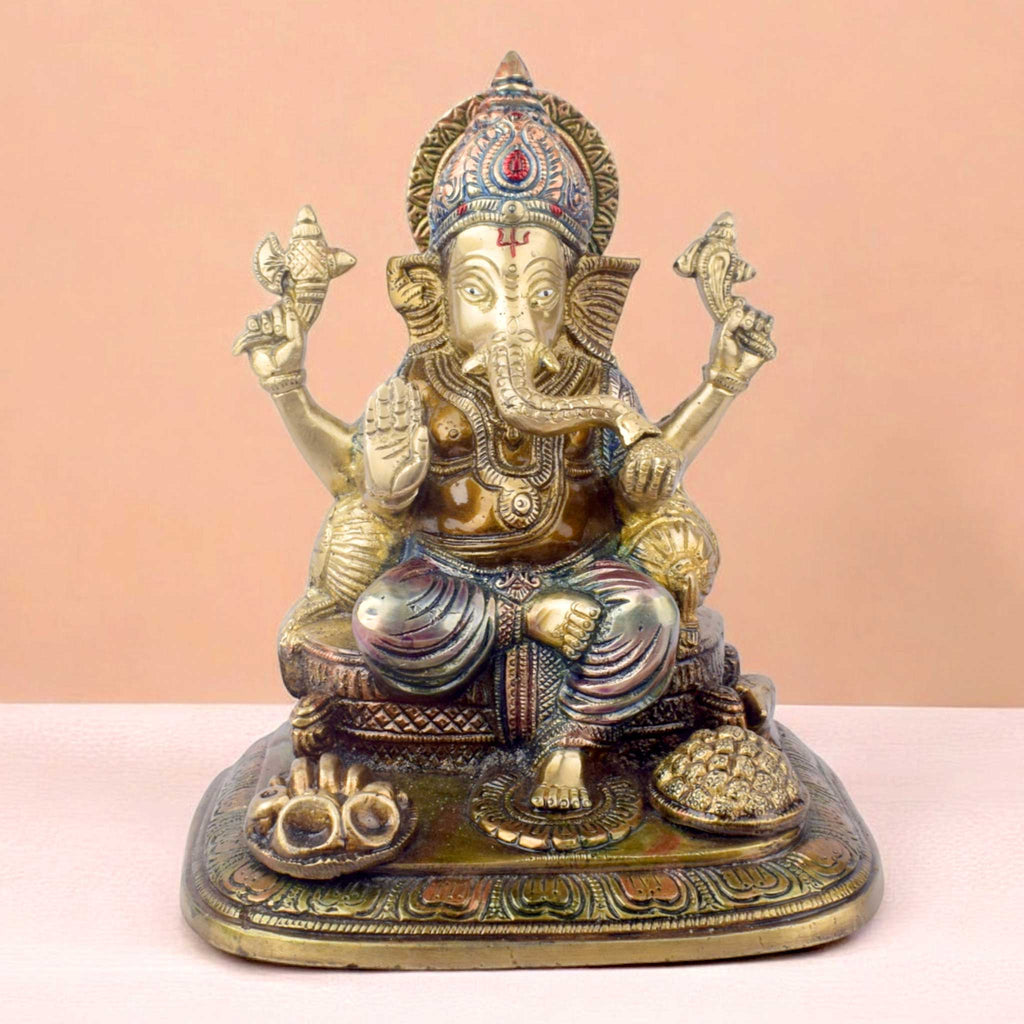 The "9.1 Inch Sacred Ganesh Idol" is a beautifully crafted statue of Lord Ganesha, symbolizing wisdom, success, and the removal of obstacles. Standing at 9.1 inches tall, it features intricate detailing and traditional attributes like the axe, lotus, and modak.