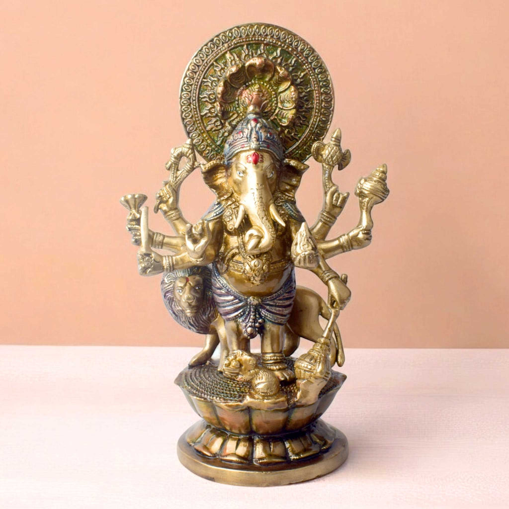 The "11.6 Inch Ganesh Idol" is a majestic and detailed representation of Lord Ganesha, embodying divine presence, prosperity, and new beginnings. Standing at 11.6 inches tall, this idol features intricate craftsmanship, capturing Ganesha’s serene expression and symbolic attributes, including his axe, lotus, and modak.