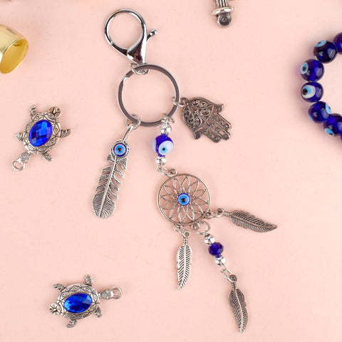 Blue Evil Eye Hamsa Leaf Dream Catcher Keychain – A spiritual and protective charm with the power of the Evil Eye and Hamsa hand. India’s Largest Pooja Accessories Brand – www.satvikstore.in