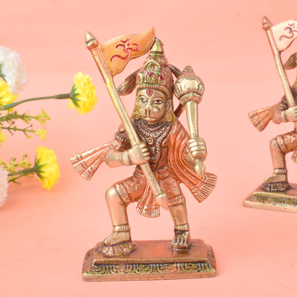 The "4.9 Inch Sacred Brass Hanuman Statue" is a beautifully crafted representation of Lord Hanuman, symbolizing strength, devotion, and protection. Standing at 4.9 inches tall, this intricately detailed statue is made from high-quality brass, capturing Hanuman’s powerful stance and serene expression.