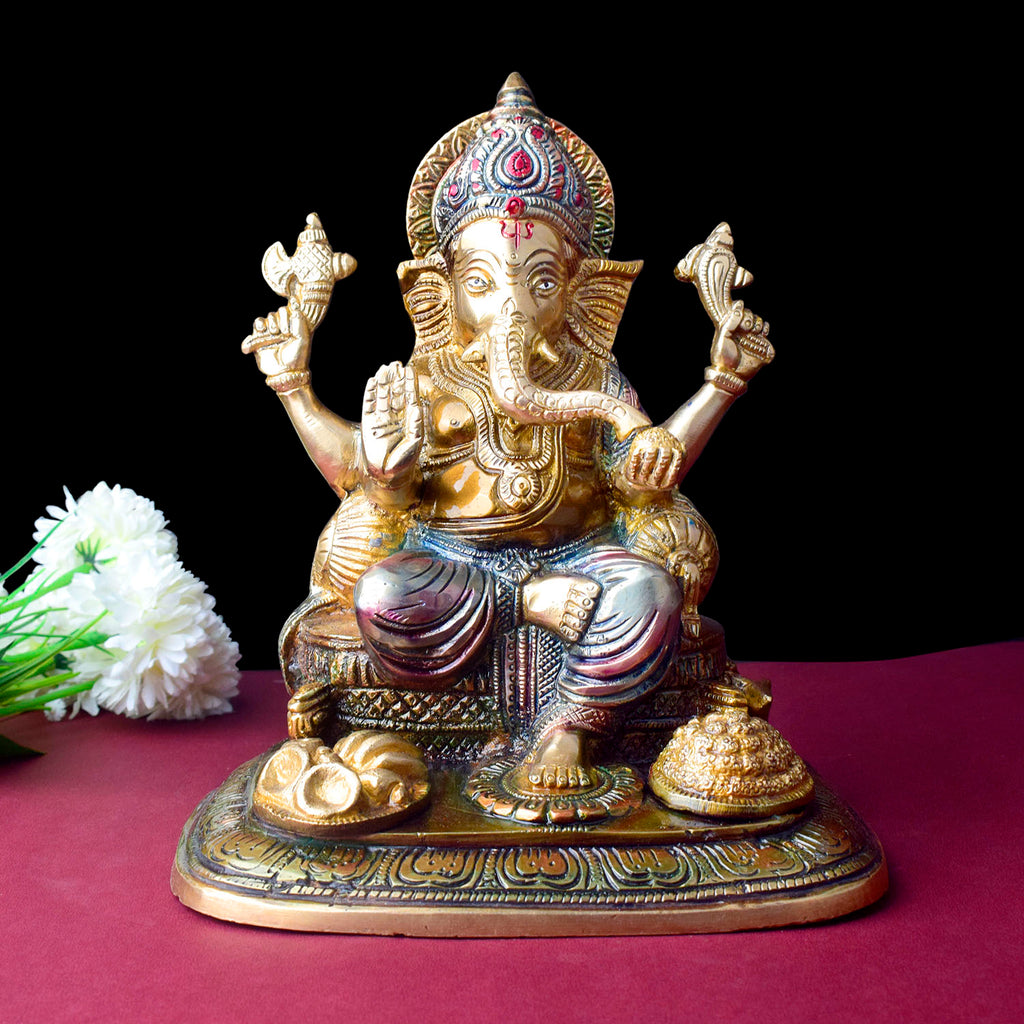 The "9.1 Inch Sacred Ganesh Idol" is a beautifully crafted statue of Lord Ganesha, symbolizing wisdom, success, and the removal of obstacles. Standing at 9.1 inches tall, it features intricate detailing and traditional attributes like the axe, lotus, and modak.