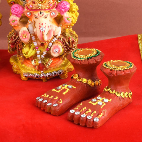 Spiritual Sole Prints Handmade Clay Charan Paduka, traditional handcrafted clay footprints symbolizing divine presence, used for pooja rituals and invoking blessings. 
India’s Largest Pooja Accessories Brand – www.satvikstore.in 