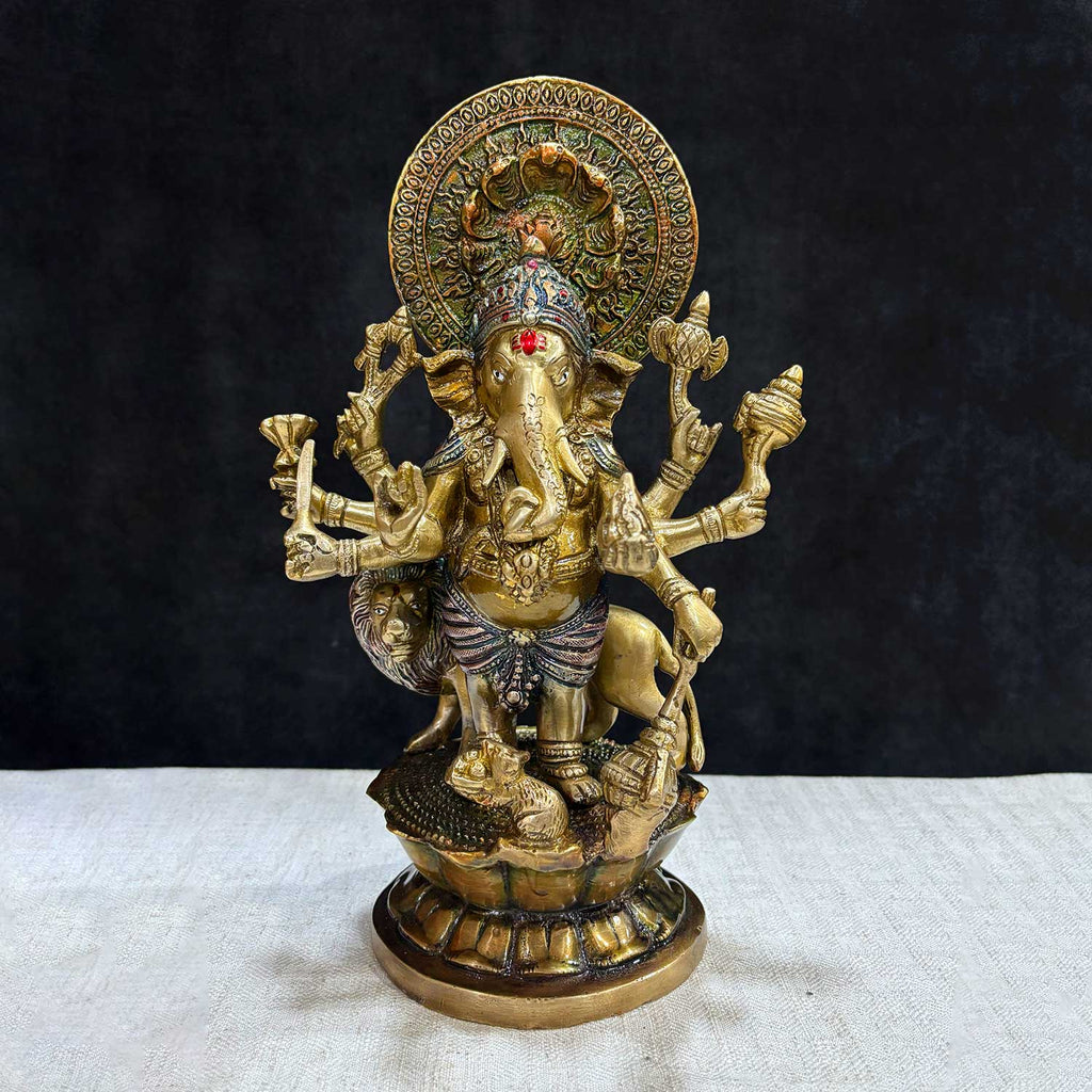 The "11.6 Inch Ganesh Idol" is a majestic and detailed representation of Lord Ganesha, embodying divine presence, prosperity, and new beginnings. Standing at 11.6 inches tall, this idol features intricate craftsmanship, capturing Ganesha’s serene expression and symbolic attributes, including his axe, lotus, and modak.