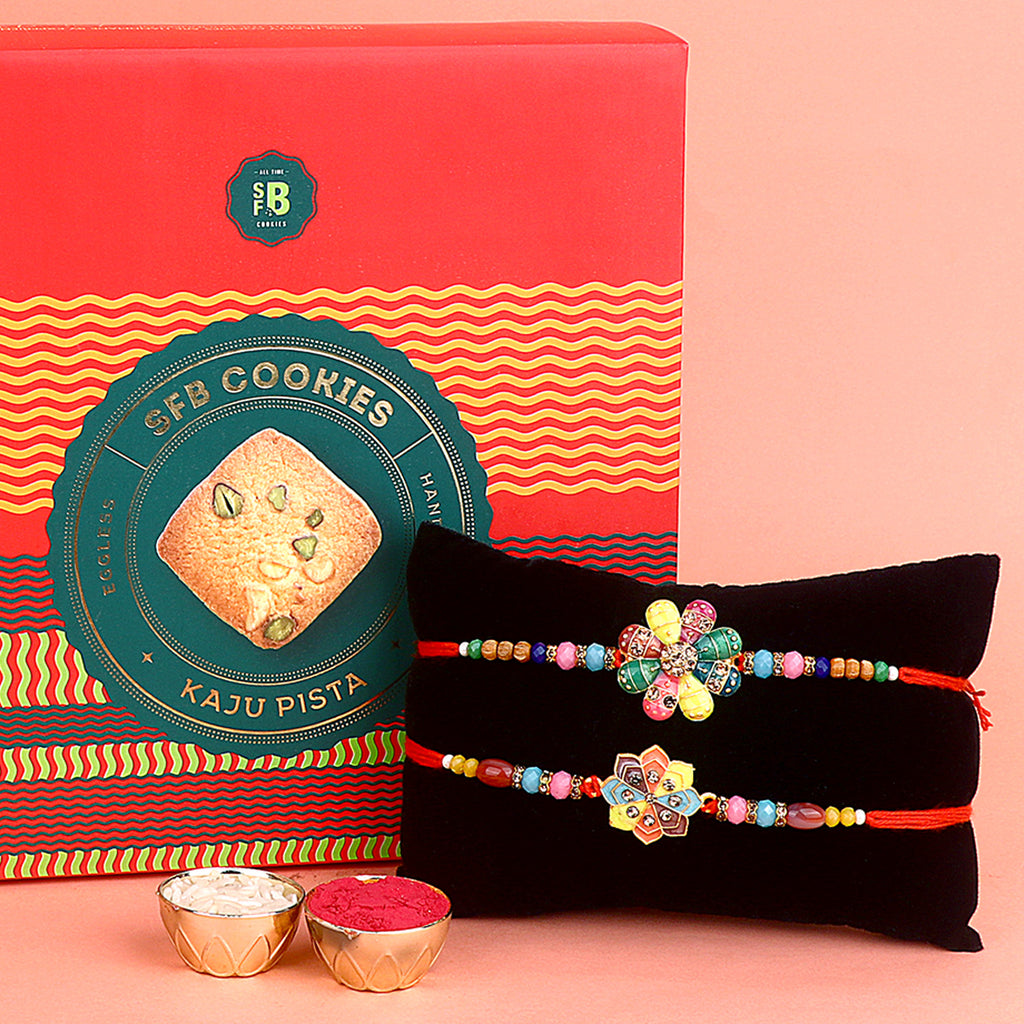 Image of a beautifully designed Rakhi with sweets, the perfect combination of tradition and sweetness for Raksha Bandhan celebration. Shop now at SatvikStore.in. #Rakhi #RakhiOnline #SendRakhi #DesignerRakhi #BeautifulRakhi #LatestRakhi #NewRakhi #ModernRakhi"