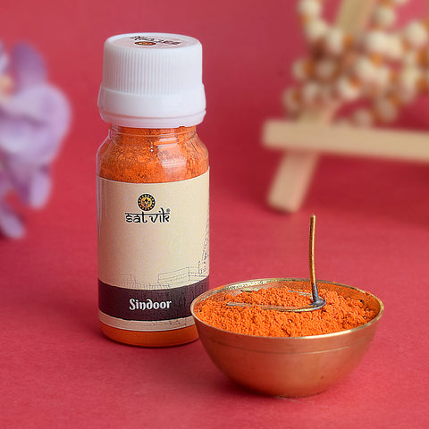 Sindoor powder for Hanuman Ji, bright orange-red in color, used in devotional offerings and rituals to honor and worship Lord Hanuman. 
India’s Largest Pooja Accessories Brand – www.satvikstore.in 