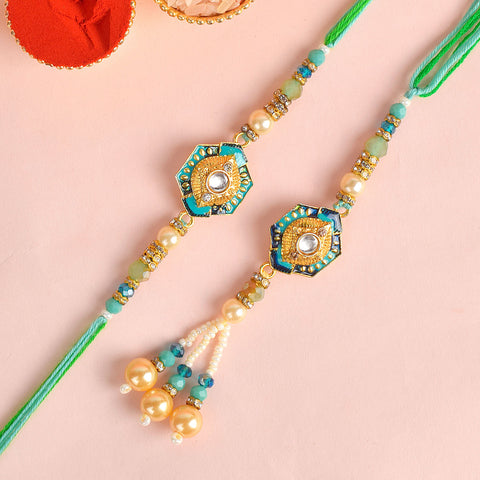 Designer Couple Rakhi Set for Bhaiya and Bhabhi with Roli Chawal and Ram Sita Stickers – Raksha Bandhan Gift Combo. India’s Largest Brass Idols Brand - www.satvikstore.in