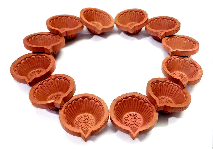 Earthen Clay Diya 12 Pc Set (Om) Puja Store Online Pooja Items Online Puja Samagri Pooja Store near me www.satvikstore.in